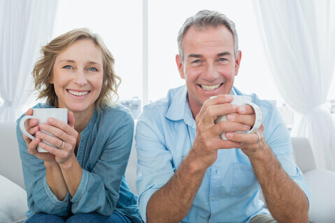 Middle aged couple with coffee